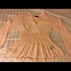 Bebe light / baby pink blouse. Never been worn.